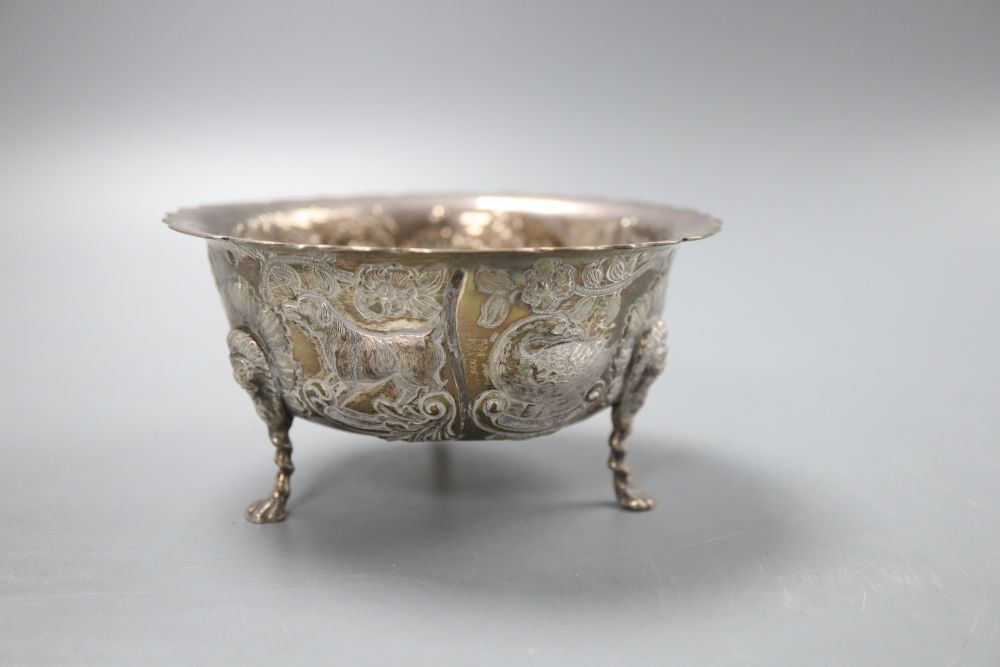 An Edwardian Irish silver sugar bowl with embossed decoration, Dublin 1908, diameter 11.5cm, 4oz.